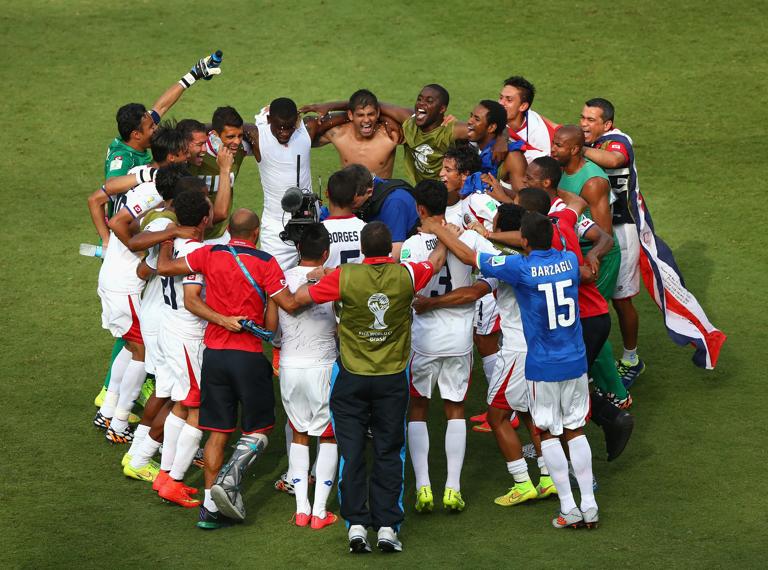 RECIFE, BRAZIL - JUNE 20:  Costa Rica players huddle on the field and celebrate the 1-0 victory in the 2014 FIFA World Cup Brazil Group D match between Italy and Costa Rica at Arena Pernambuco on June 20, 2014 in Recife, Brazil.  (Photo by Michael Steele/Getty Images)