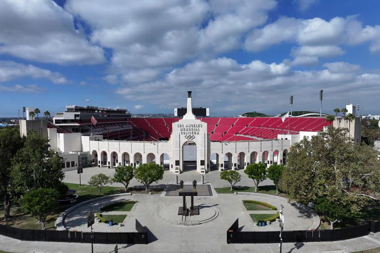 LOS ANGELES, CALIFORNIA - OCTOBER 01: A general overall aerial view of the Los Angeles Memorial Coliseum peristyle and Olympic Torch on October 01, 2025 in Los Angeles, California.  (Photo by Kirby Lee/Getty Images)
