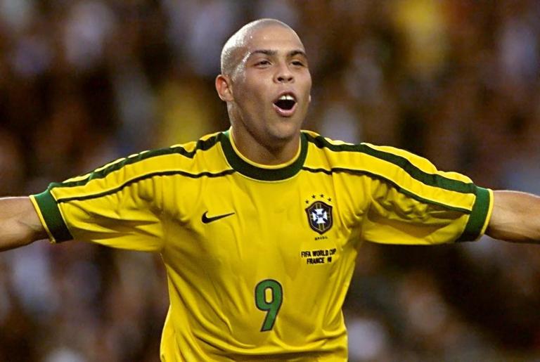 Brazilian forward Ronaldo jubilates after scoring his second goal during the 1998 Soccer World Cup second round match between Brazil and Chile 27 June at the Parc des Princes stadium in Paris. Ronaldo and team-mate Cesar Sampaio scored twice giving Brazil a 4-1 victory over Chile. (ELECTRONIC IMAGE)   AFP PHOTO (Photo credit should read PEDRO UGARTE/AFP via Getty Images)