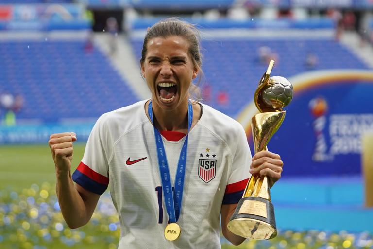 Tobin Heath of the USA celebrating with the trophy after their victory during the 2019 FIFA Women's World Cup France Final match between The United States of America and The Netherlands at Stade de Lyon on July 7, 2019 in Lyon, France.
